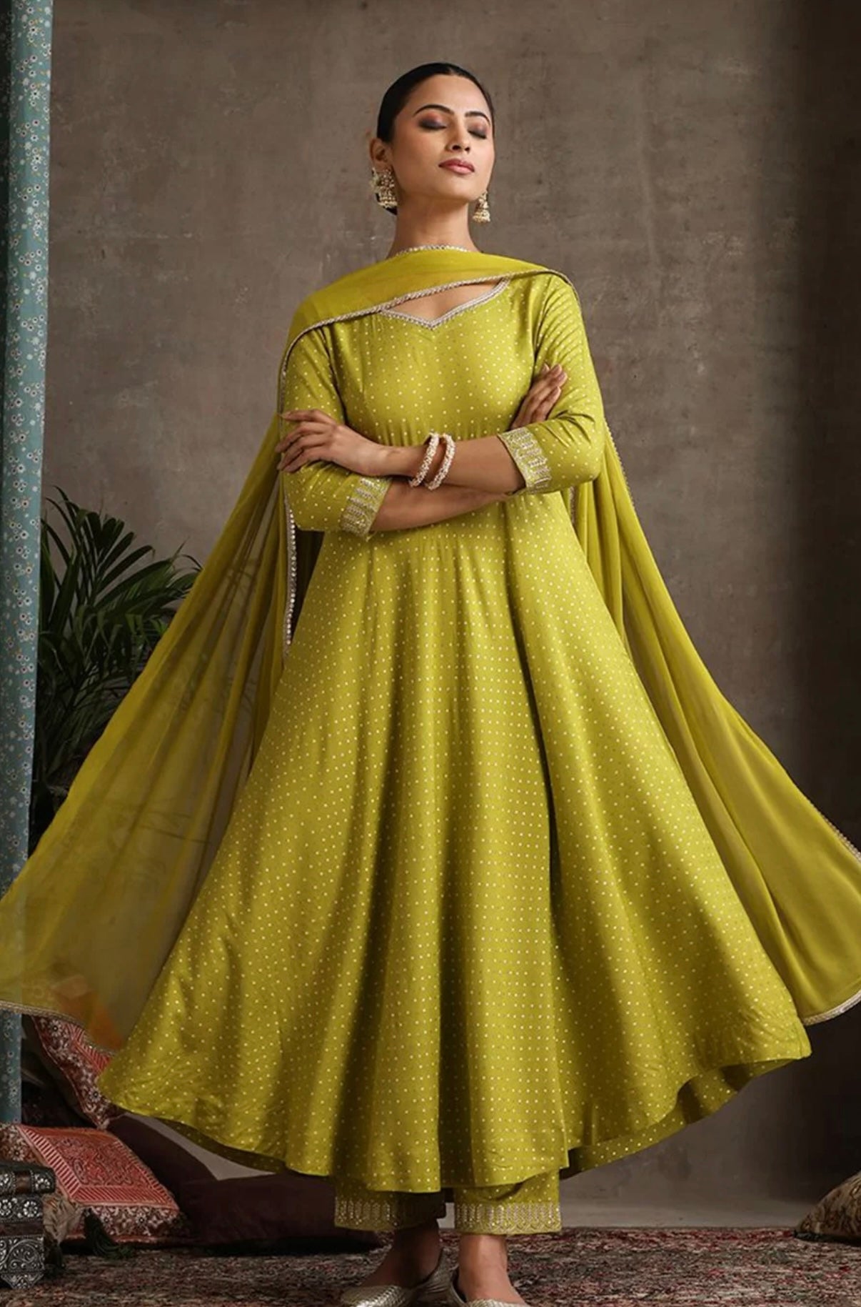 Green ssuit with golden thread work