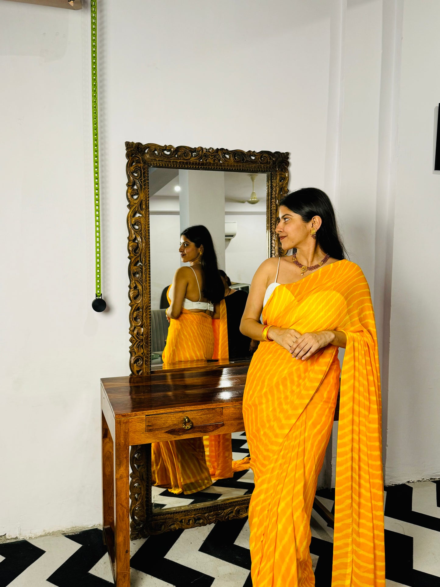 Synthetic chiffon lehriya saree in yellow