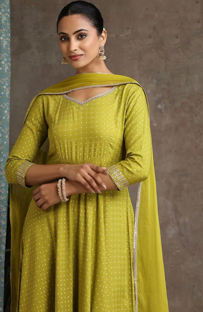 Green ssuit with golden thread work