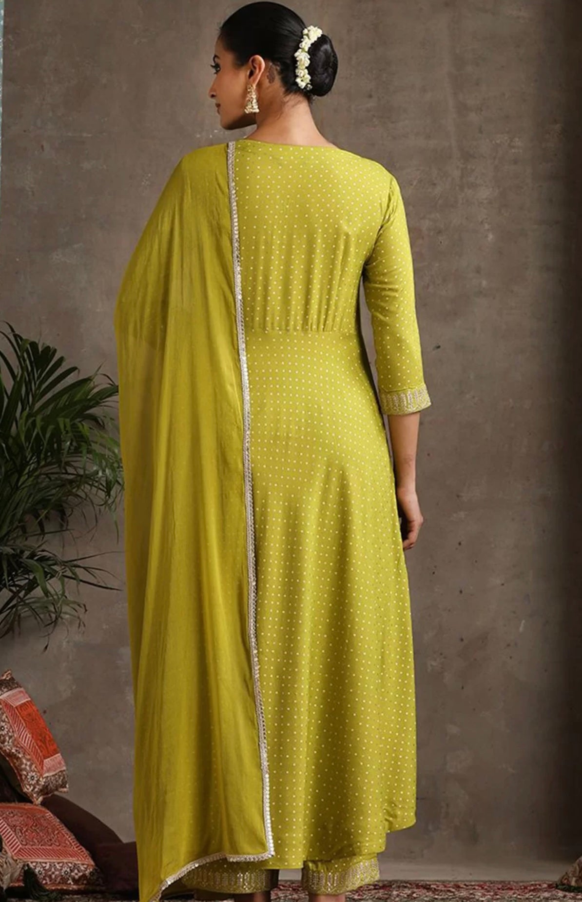 Green ssuit with golden thread work