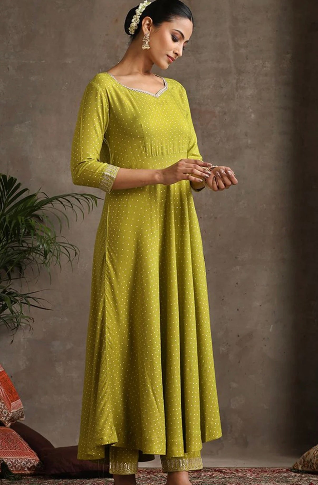 Green ssuit with golden thread work