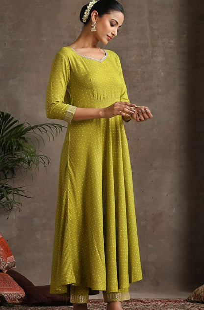 Green ssuit with golden thread work