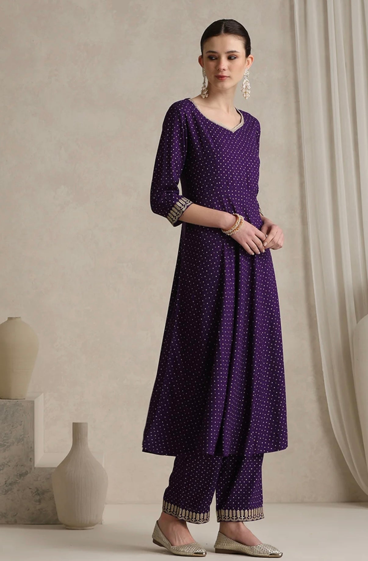 Purple suit with golden thread work