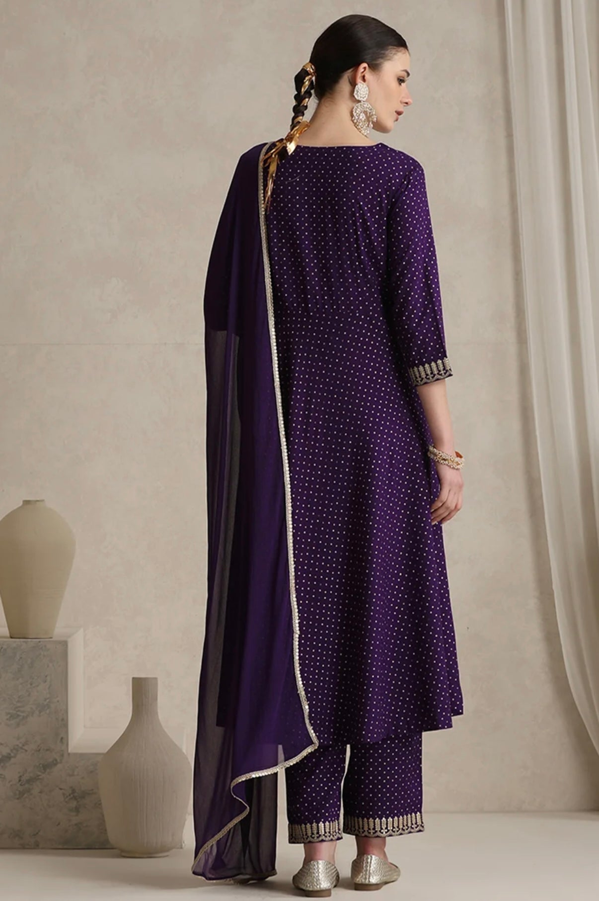 Purple suit with golden thread work