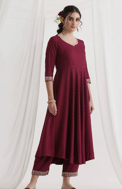 Red suit with golden thread work