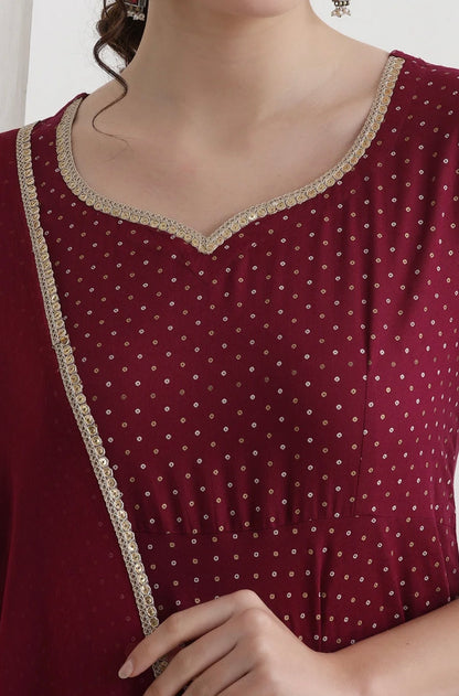 Red suit with golden thread work