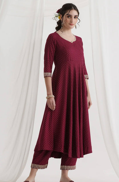 Red suit with golden thread work