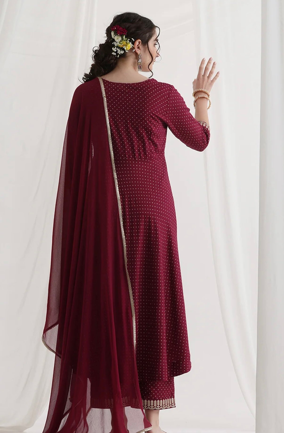 Red suit with golden thread work