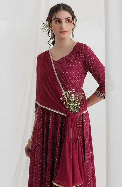 Red suit with golden thread work