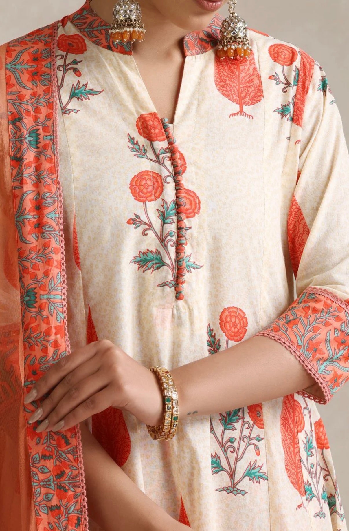 Adishaa floral block print suit with pant and dupatta in Orange