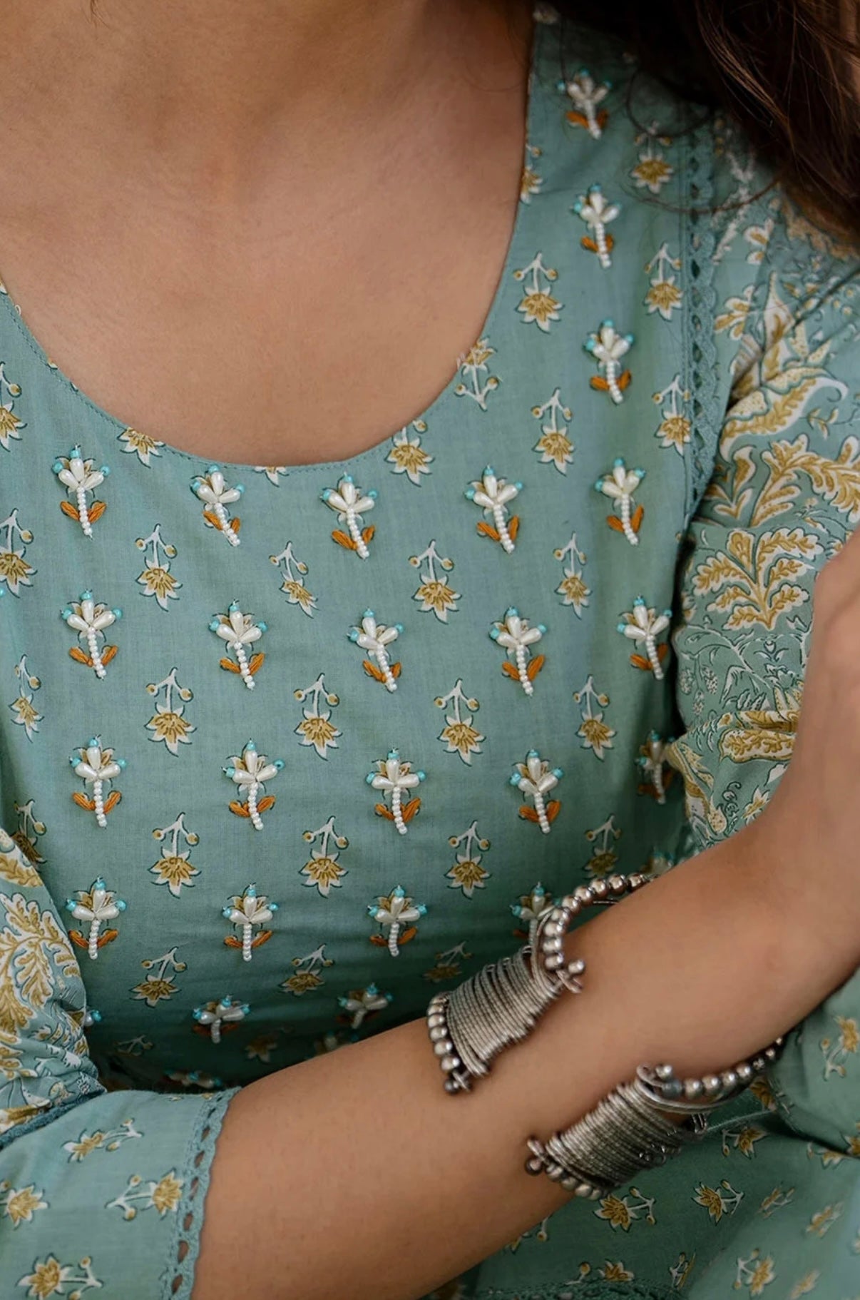 Adishaa green lacework anarkali suit