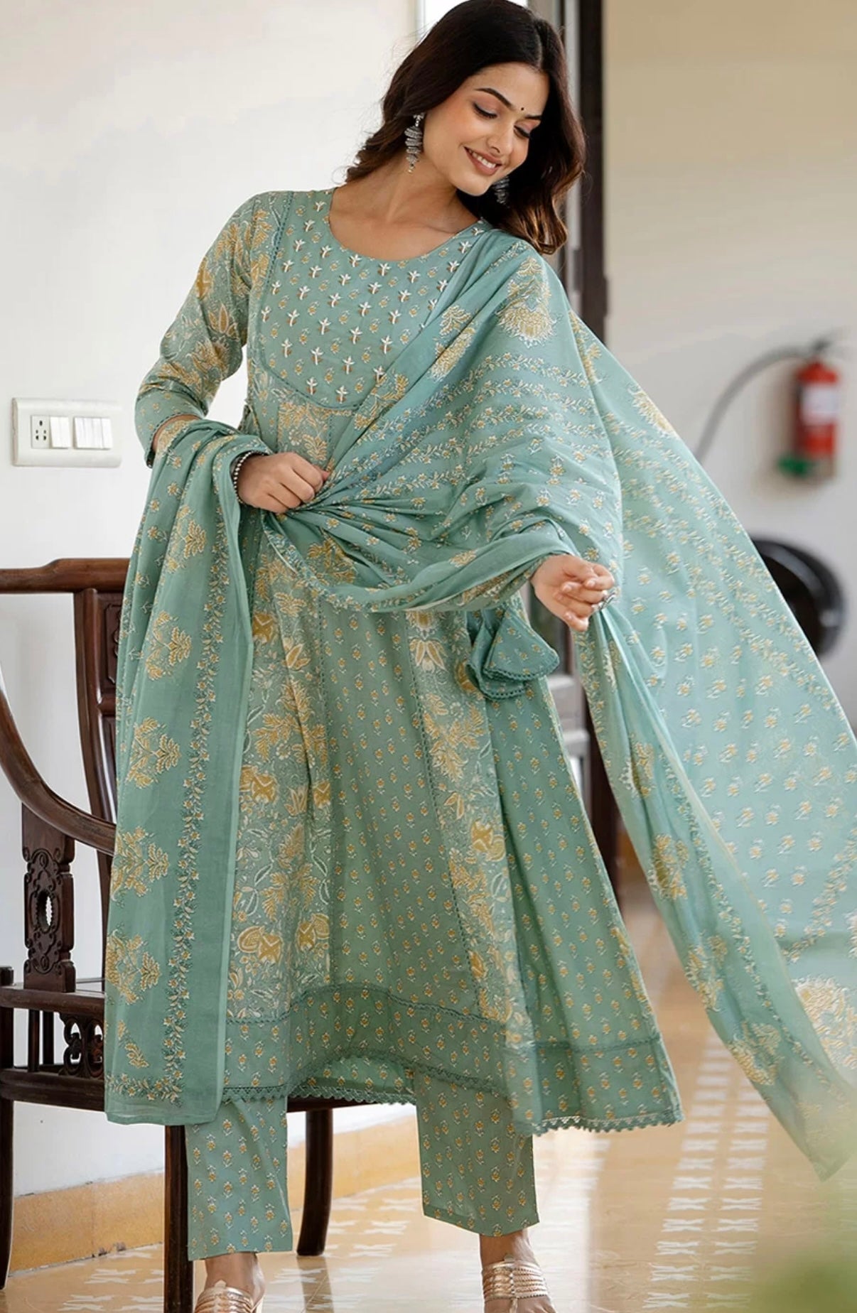 Adishaa green lacework anarkali suit